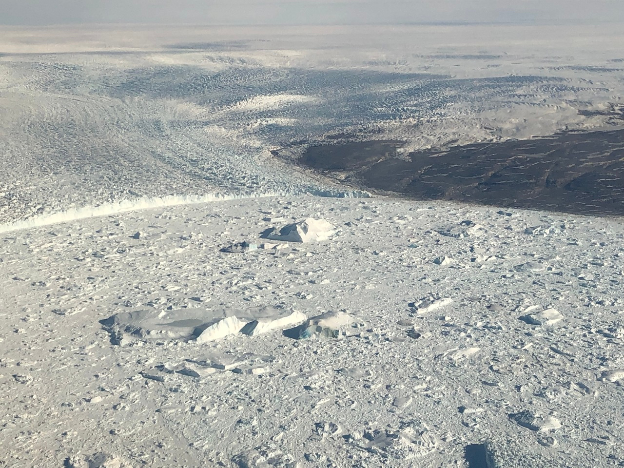 Quantifying the impact of retreating glaciers on Greenland ice loss