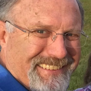 Go to the profile of John Olsen