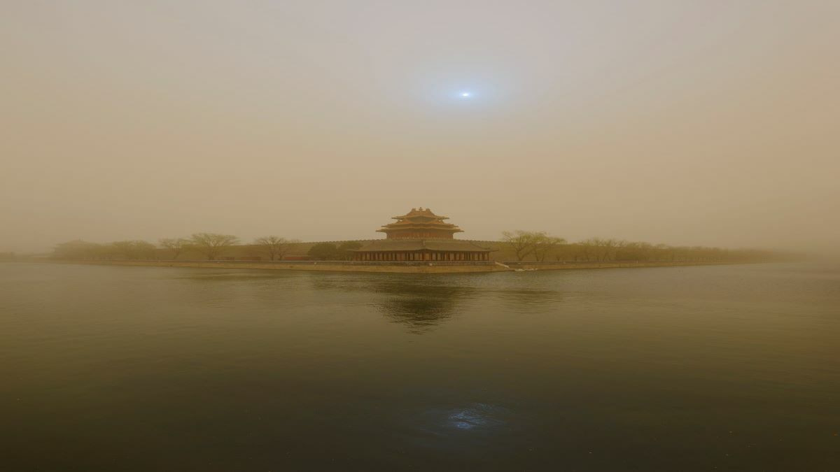 Why does East Asian dust activity decrease in the past two decades?