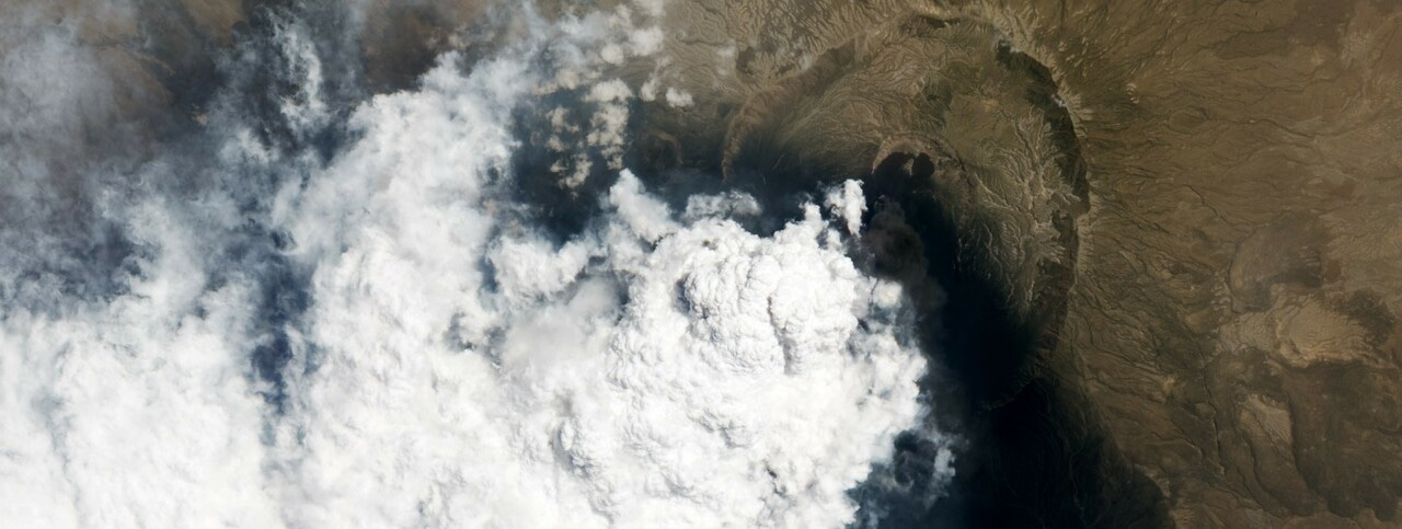 The influence of the Asian summer monsoon on volcanic aerosol transport in the UTLS region