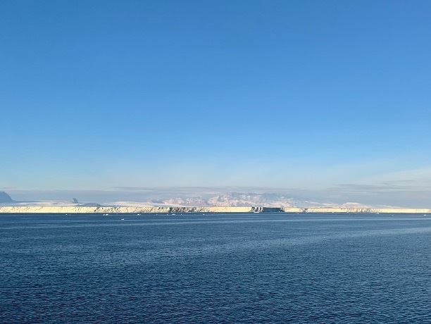 Underwater glider observations reveal eddy-driven heat transport near an Antarctic ice shelf